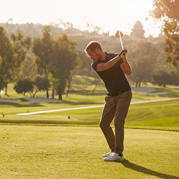 Man playing golf