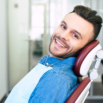Smiling man in the dental chair