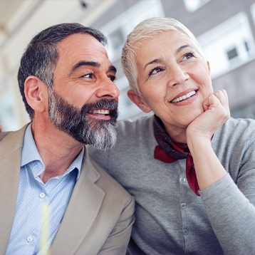 An older couple smiling together