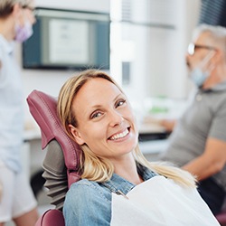 Woman smiling in the dental chair