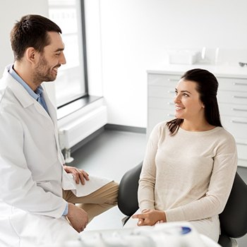 patient talking to dentist in Wylie