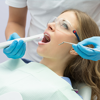 Dentist capturing intraoral photos