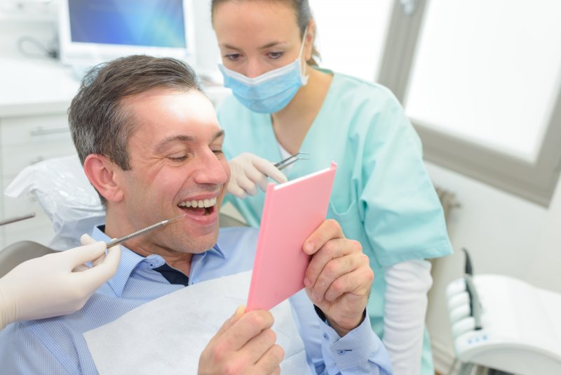 patient smiling during dental checkup