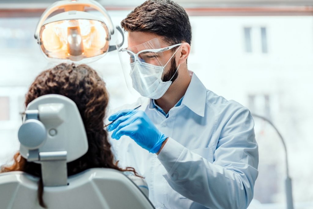 person having dental crown placed 